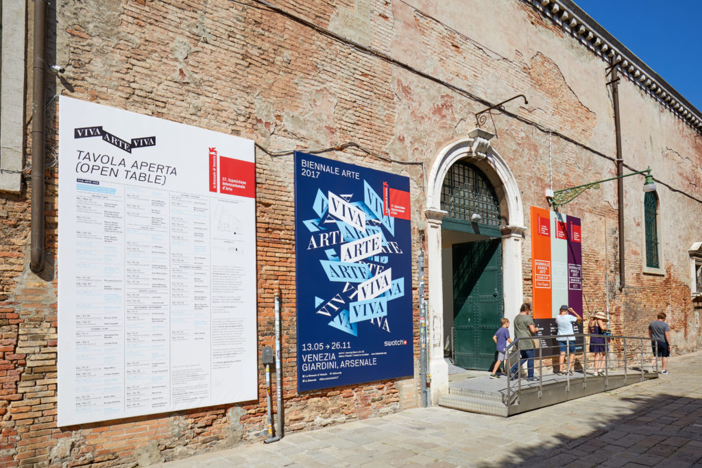 VENICE, ITALY - AUGUST 15, 2017: Biennale arte, art biennial exhibition entrance witn people in a sunny day in Venice